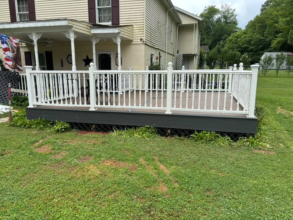 Custom deck installation with white vinyl railing in Bridgeport, WV