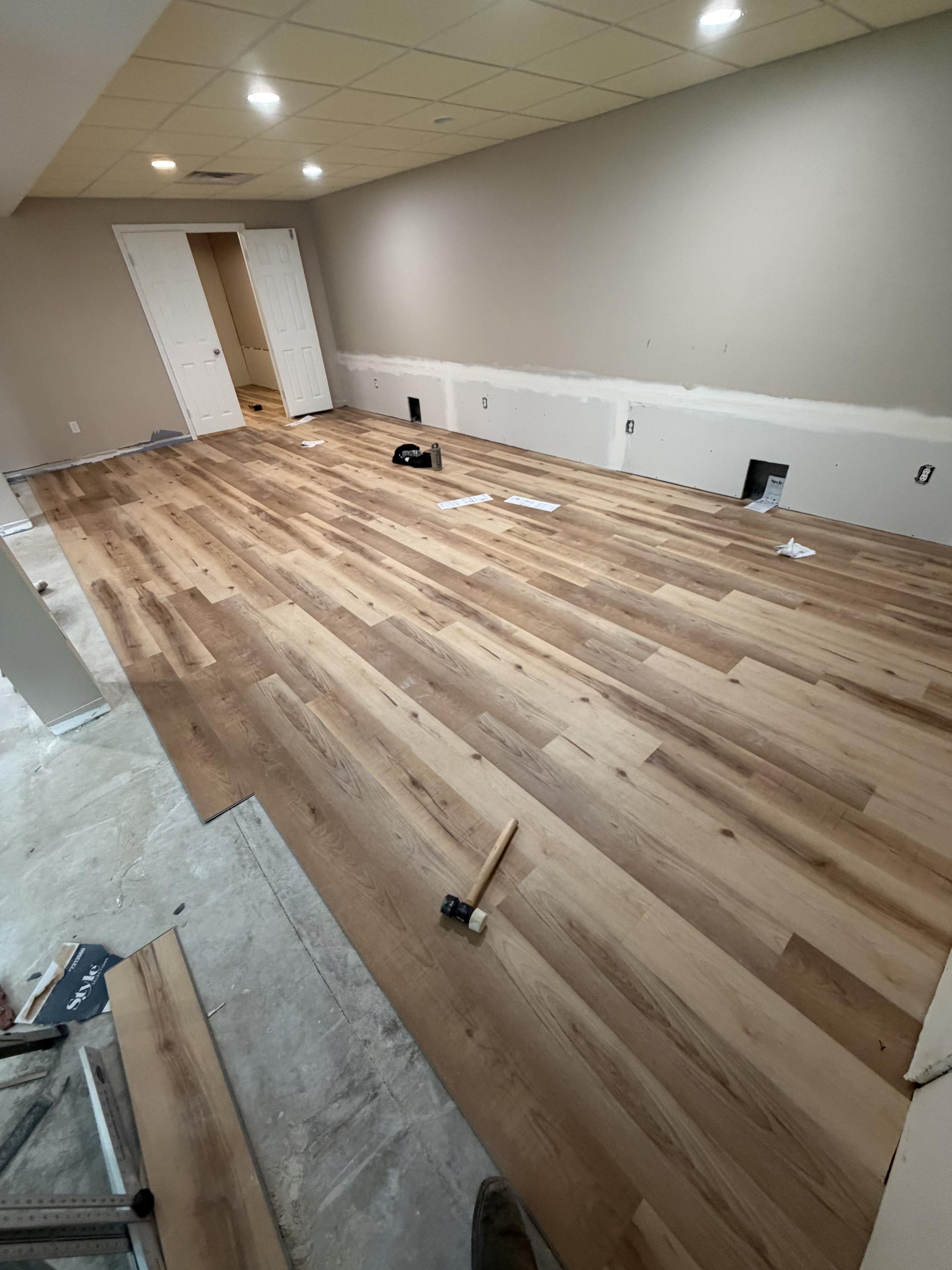 Luxury vinyl plank flooring installation by a construction company in Bridgeport, WV