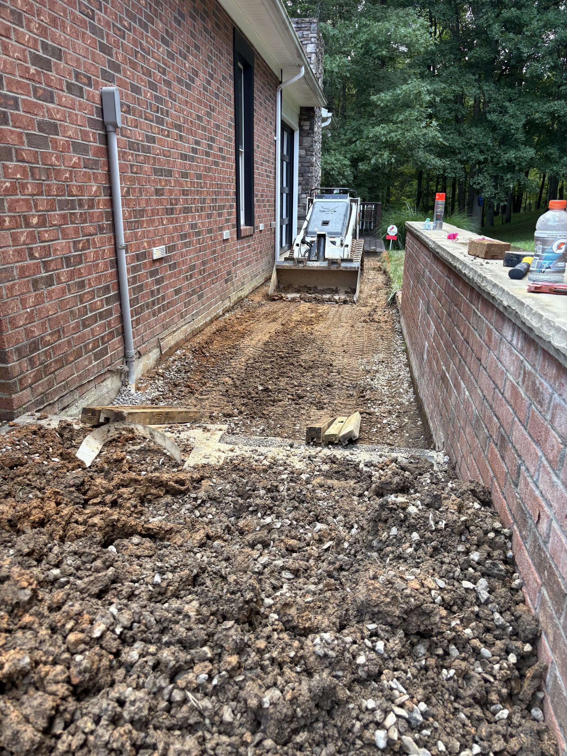 Site work and excavation beside a Bridgeport, WV home
